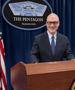 Bestselling author Alan Jacobson at Pentagon podium